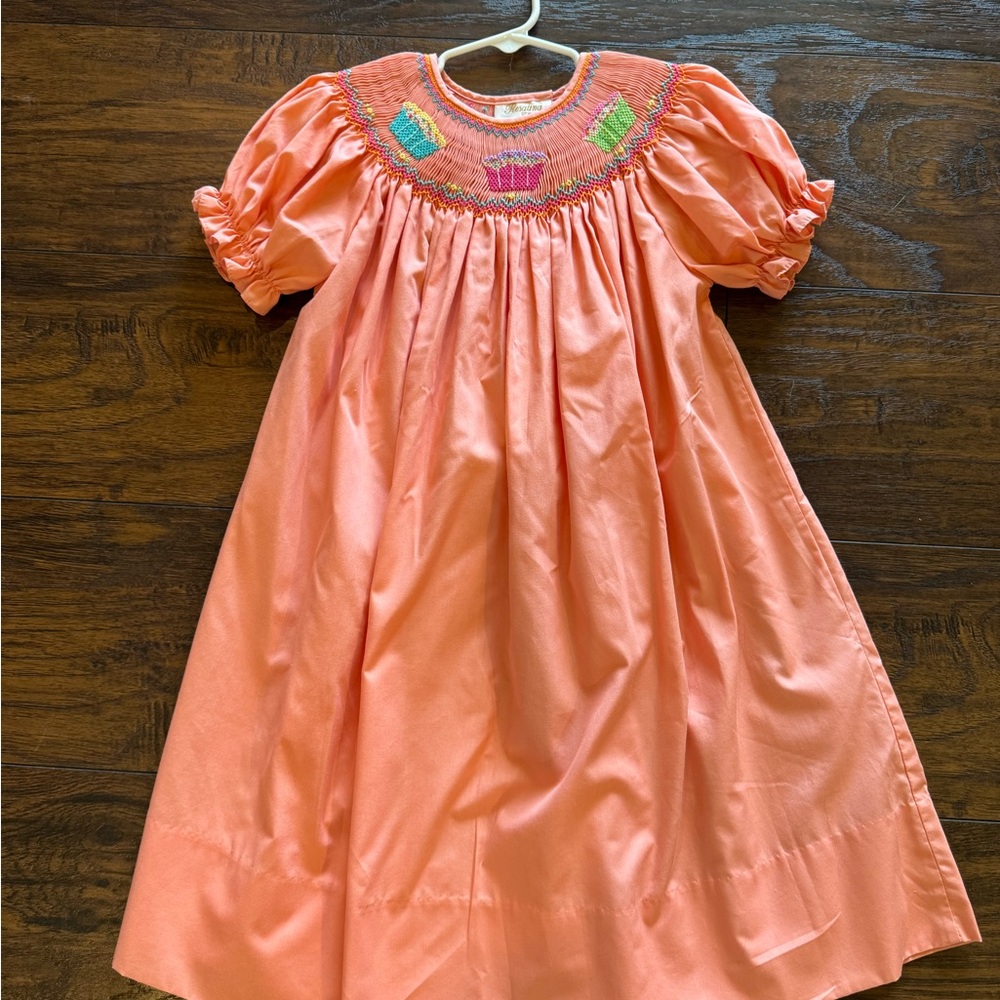 Rosalina Collection Coral Dress with cupcake embroidery.